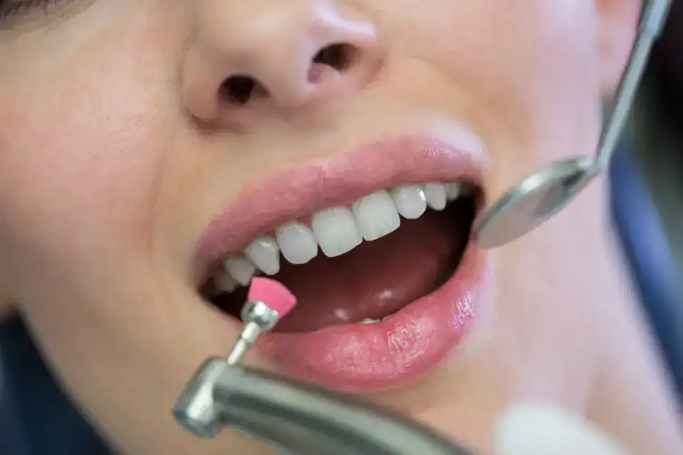 A bright, modern dental hygiene room at Willow Dental in Reading, featuring clean dental equipment and a comfortable chair.