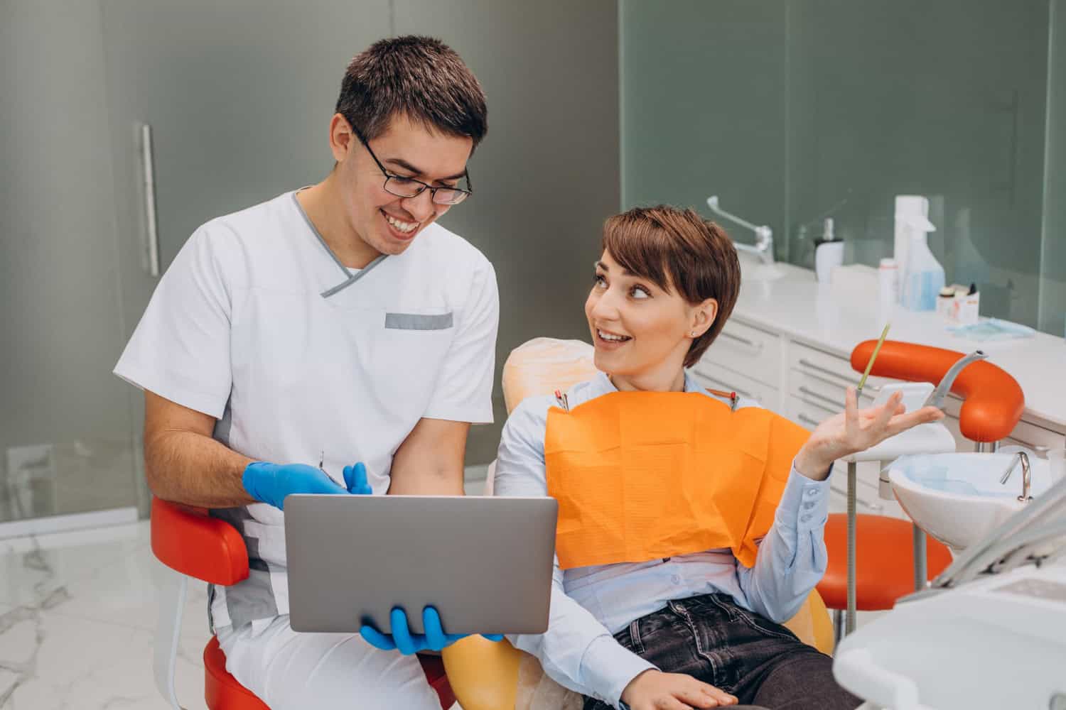 Dental crown consultation in Reading, MA with a dentist explaining restorative treatment options to a patient.